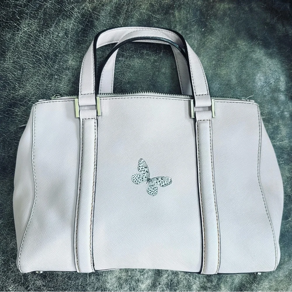 Kate Spade Light Pink Satchel with Floral and butterfly  Design 100% leather
